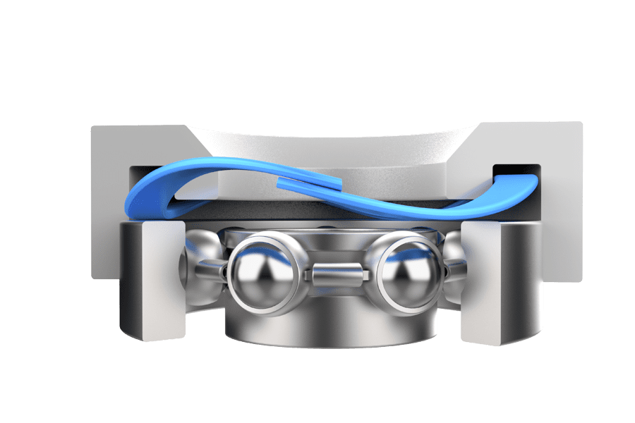 Single-turn wave spring maintaining bearing preload in a compact assembly.