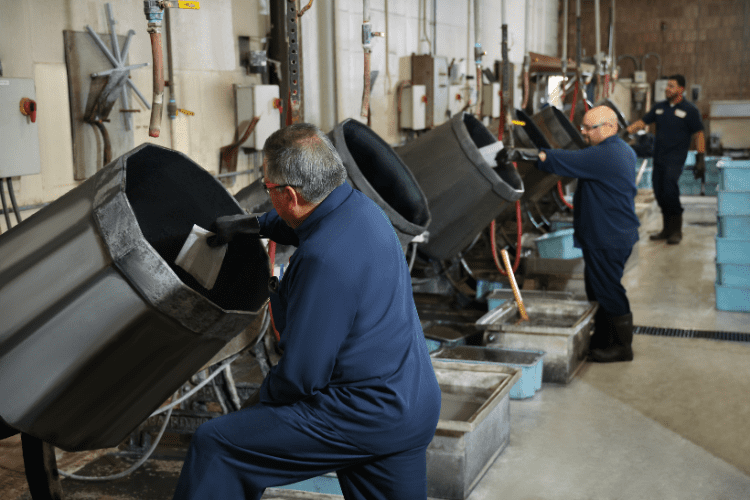 barrels filled with parts for finishing operations