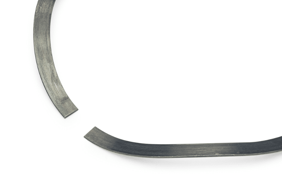 An illustration of a single-turn wave spring with gap-type ends, featuring a controlled opening between the spring ends to accommodate assembly clearance requirements while providing reliable compression and deflection in industrial applications.