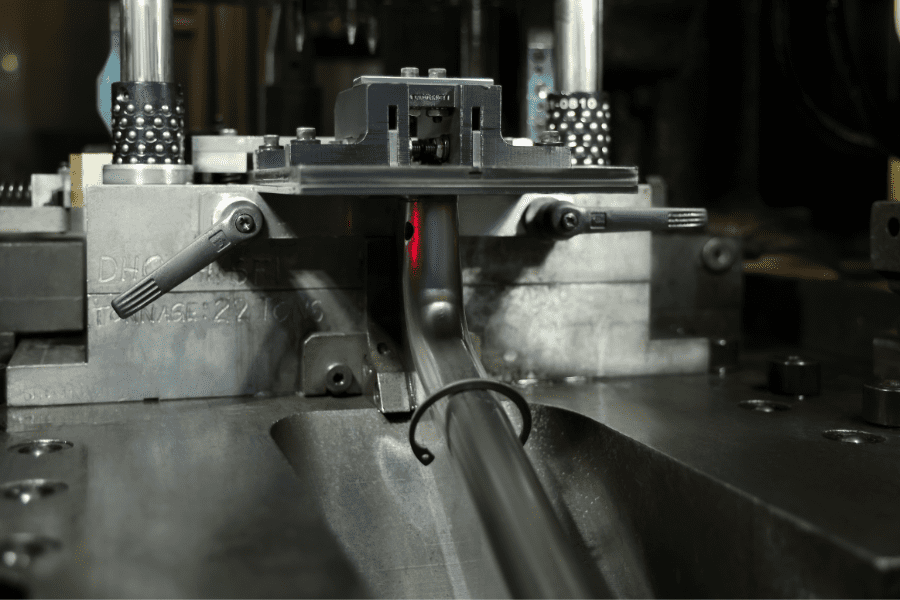 retaining ring exiting the stamping press
